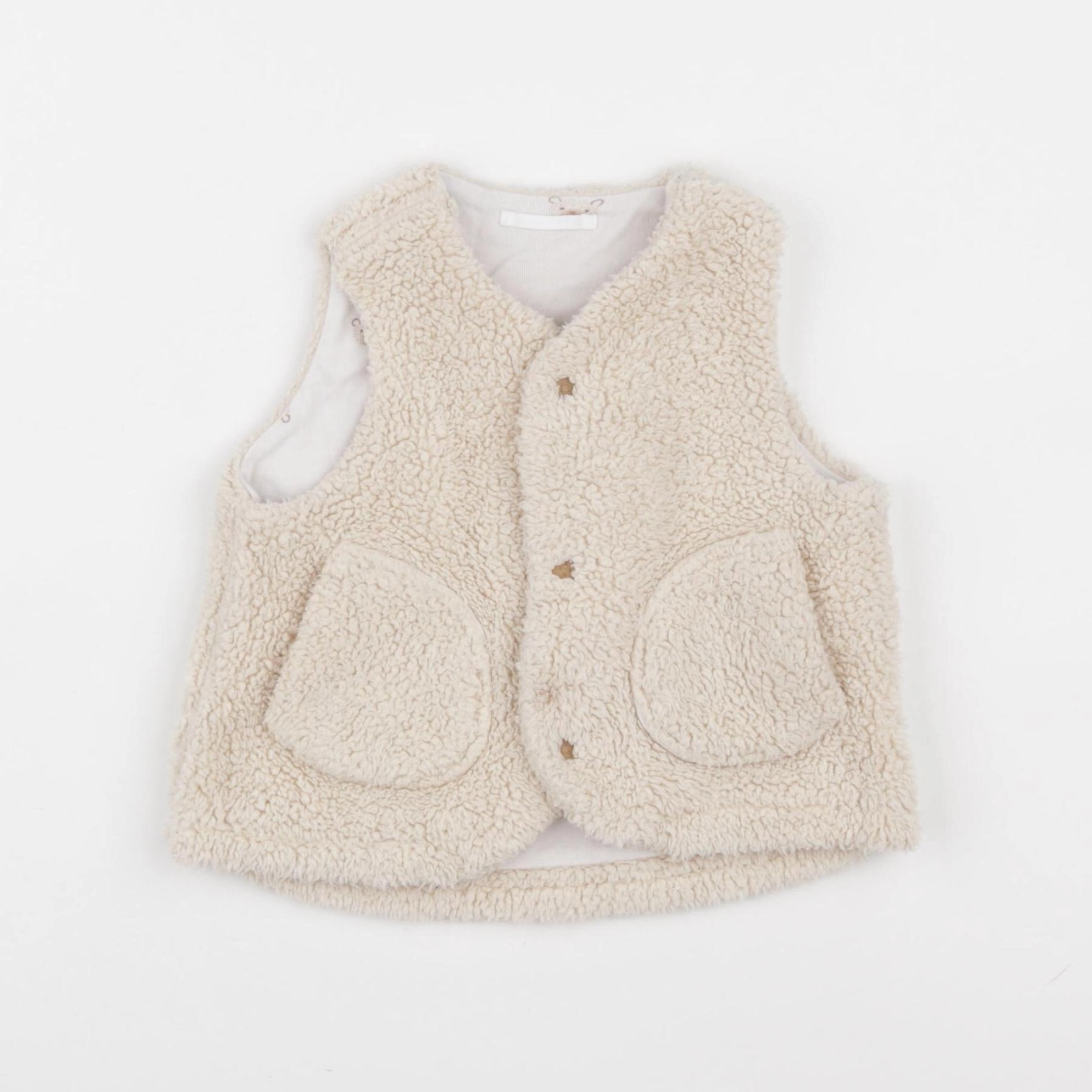 Uniqlo - gilet beige - 6/12 mois