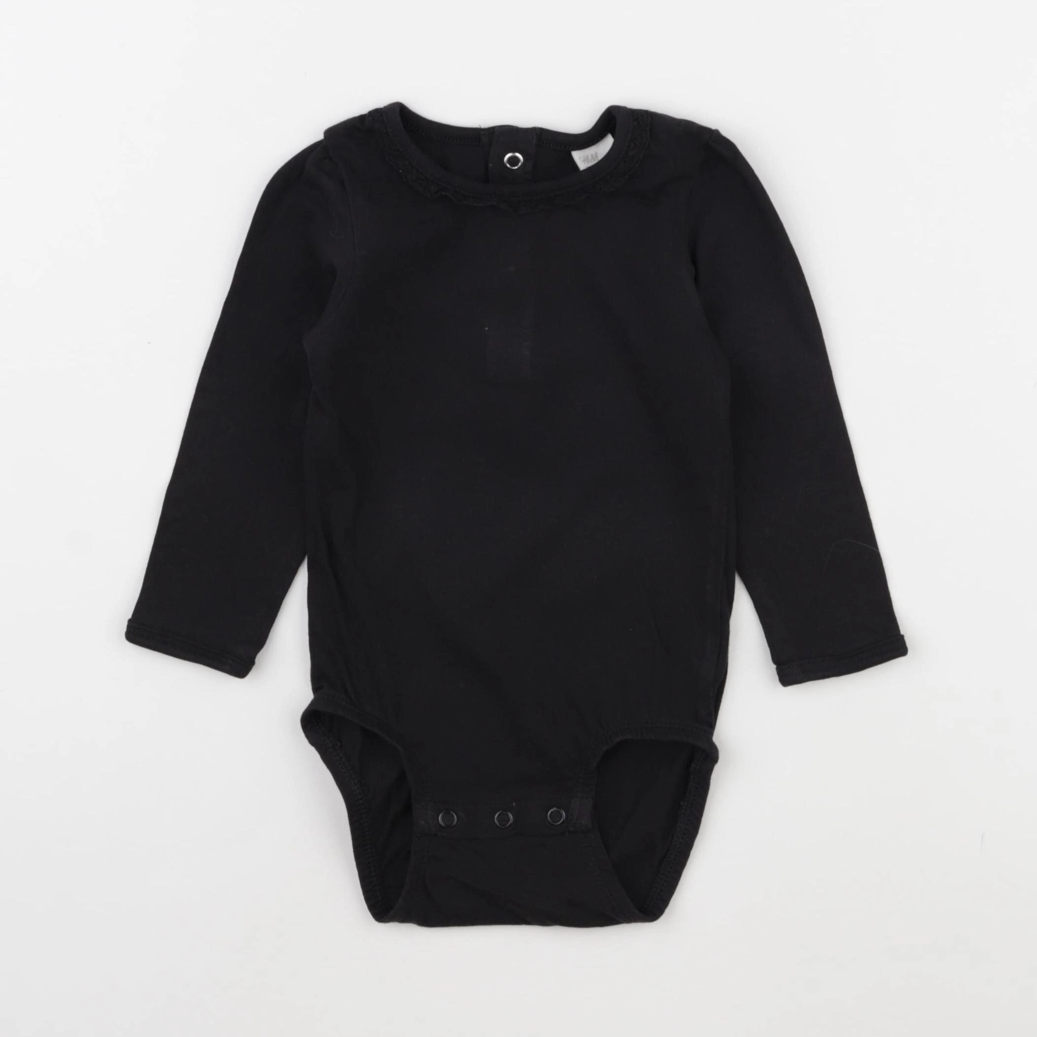 H&M - body noir - 12 mois