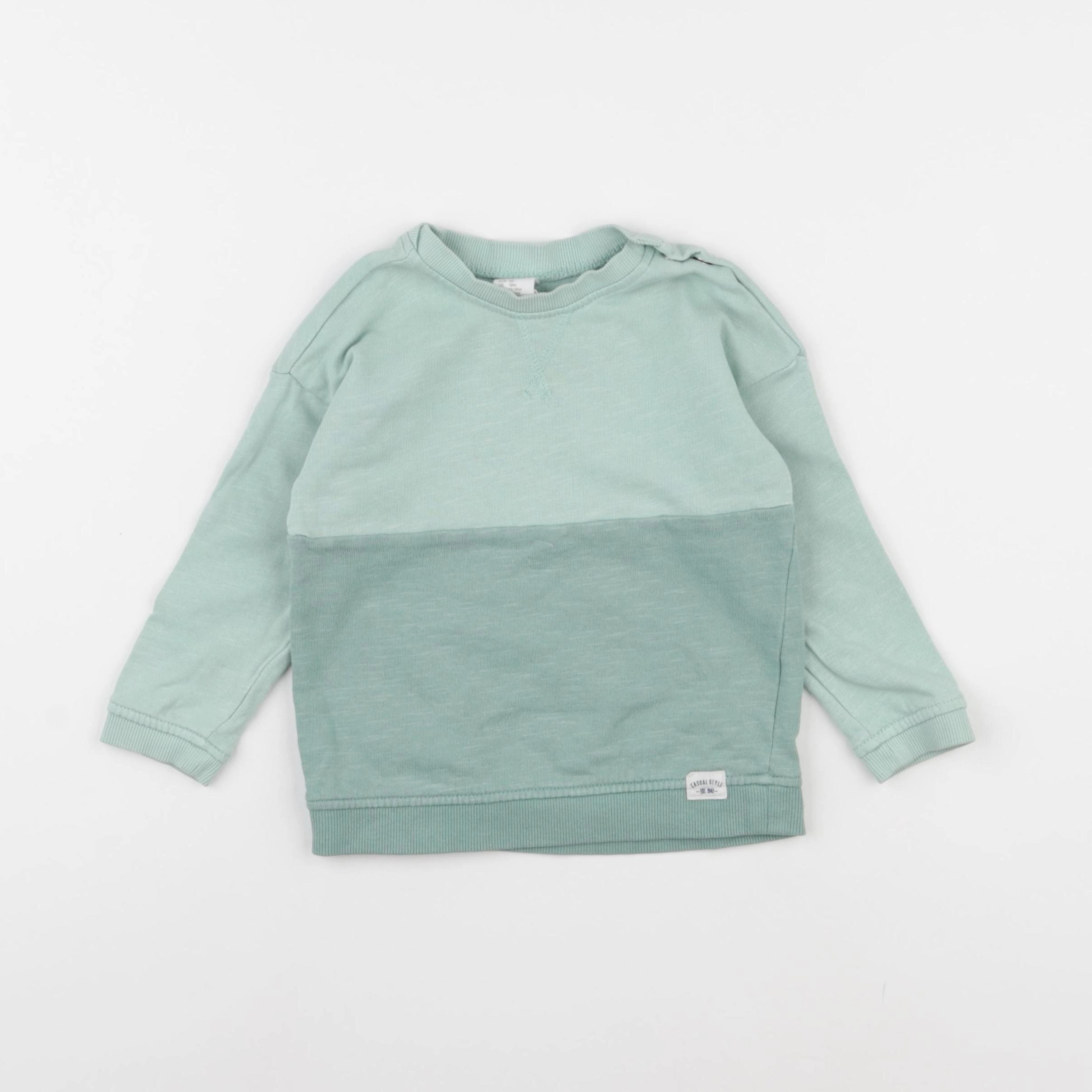 H&M - sweat vert - 12/18 mois