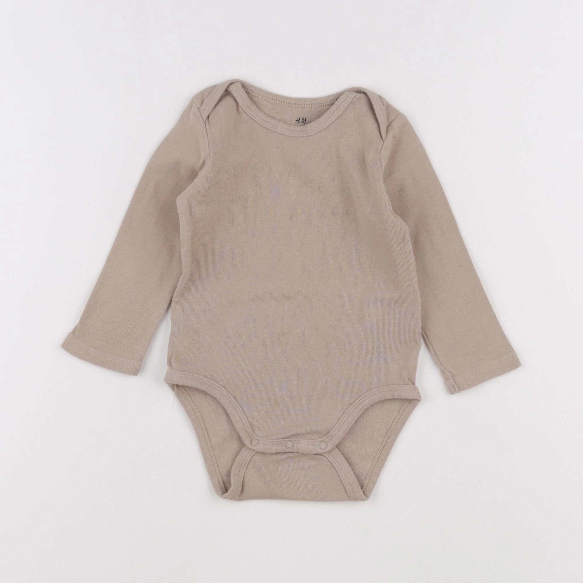 H&M - body beige - 3/6 mois