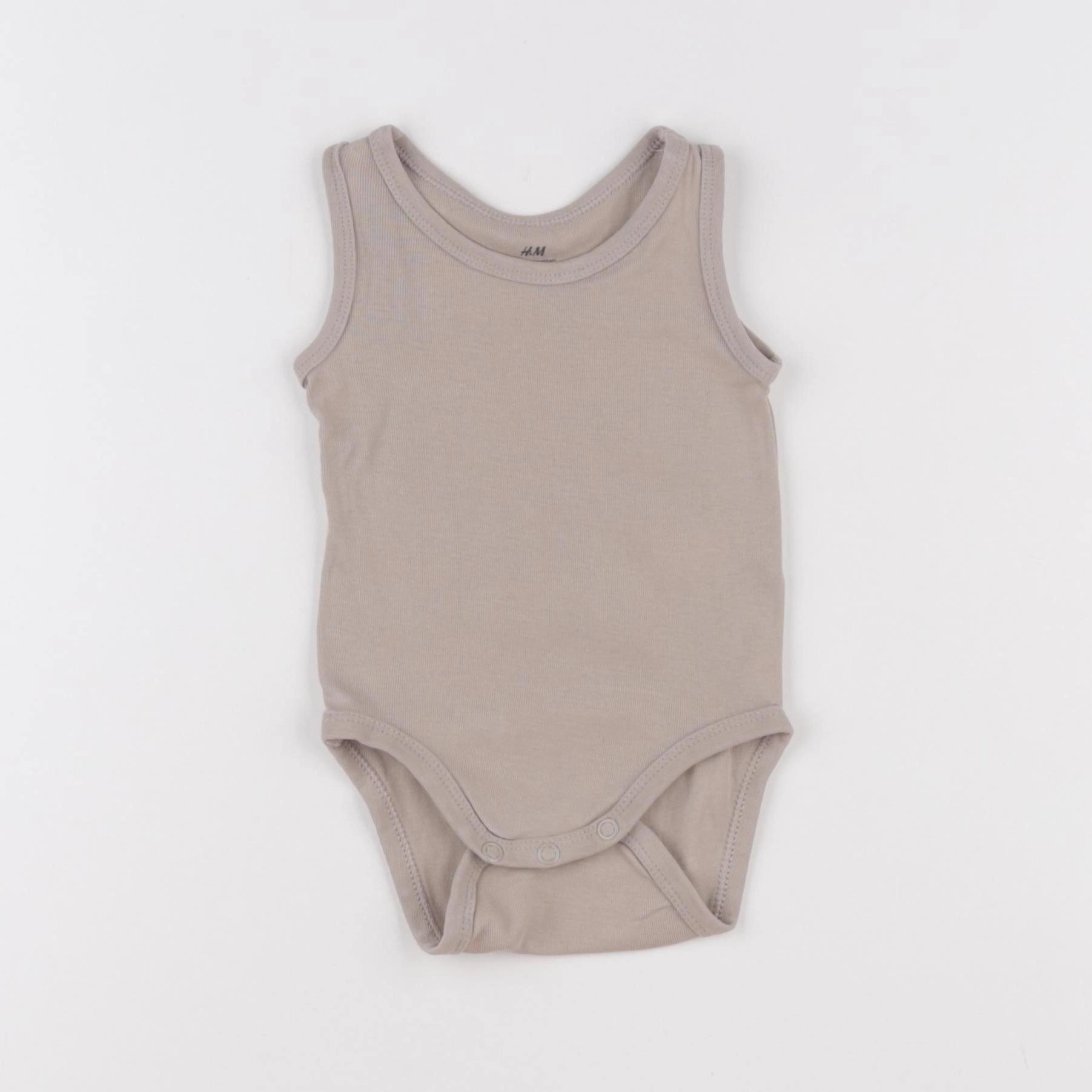 H&M - body beige - 3/6 mois