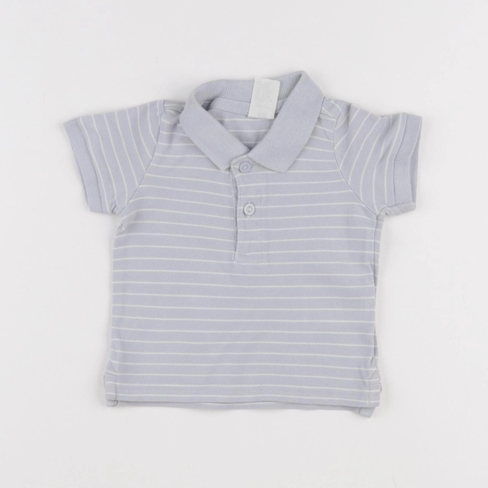H&M - polo bleu - 1/3 mois