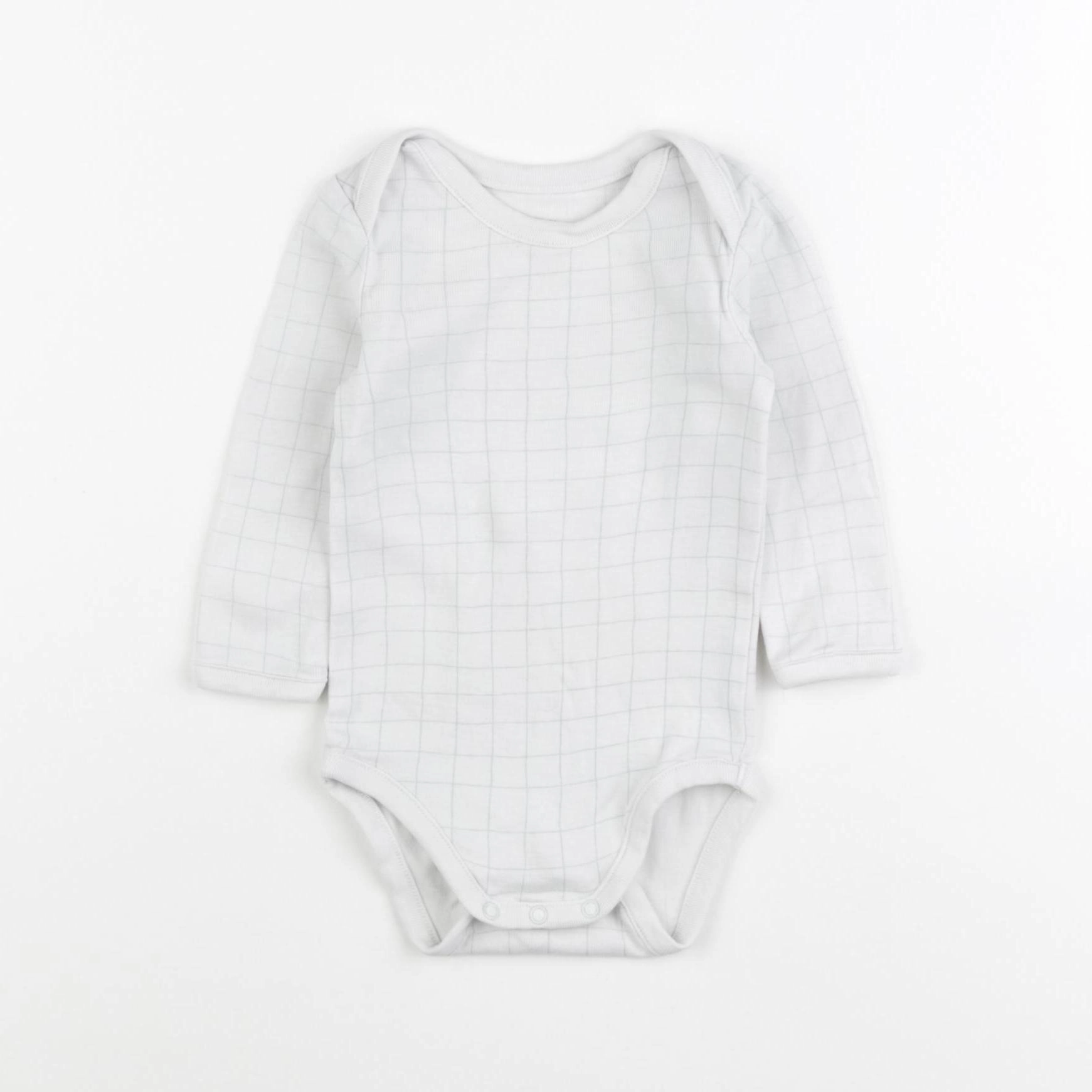 Boutchou - body blanc - 9 mois