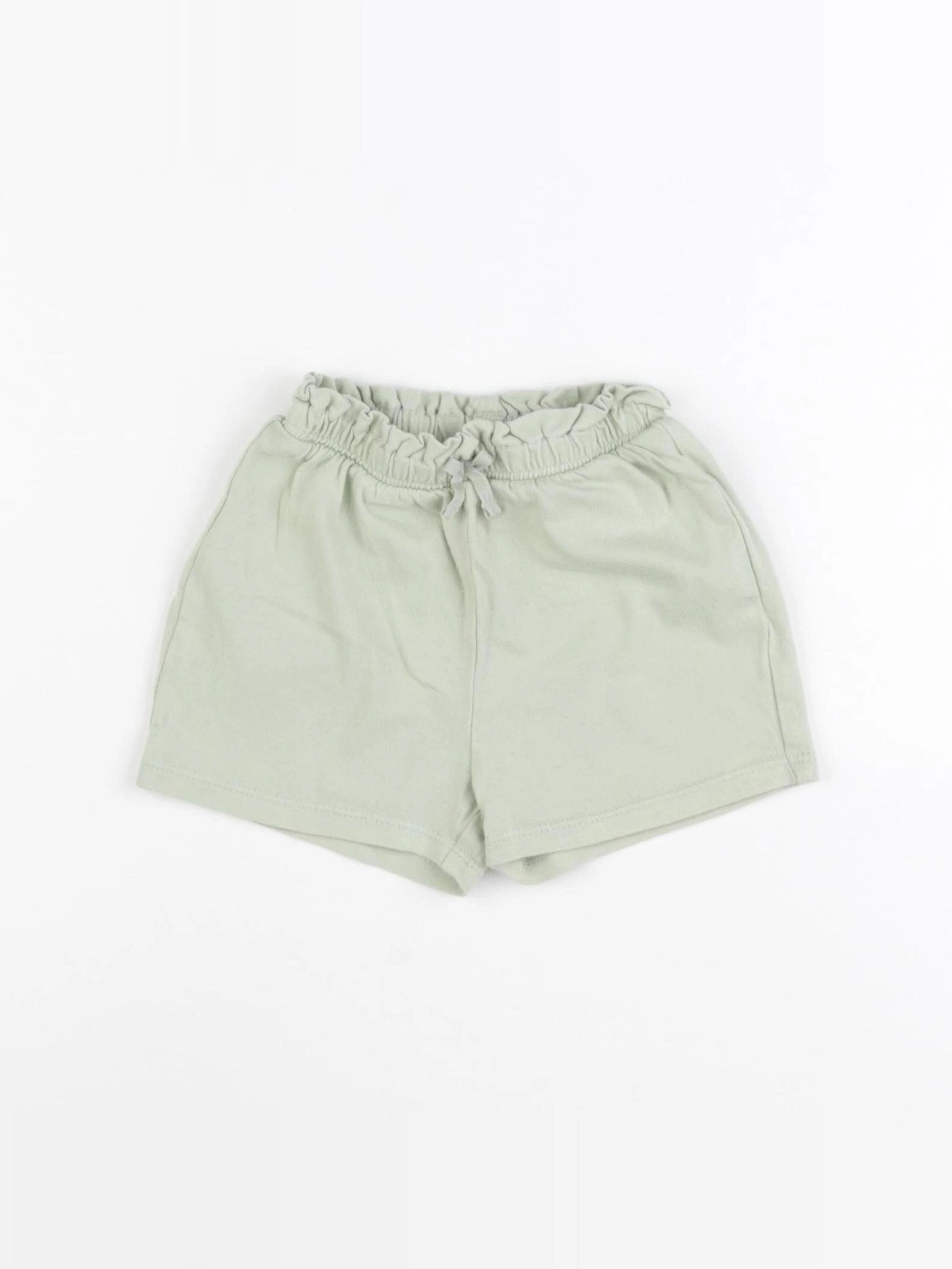 H&M - short vert - 12/18 mois