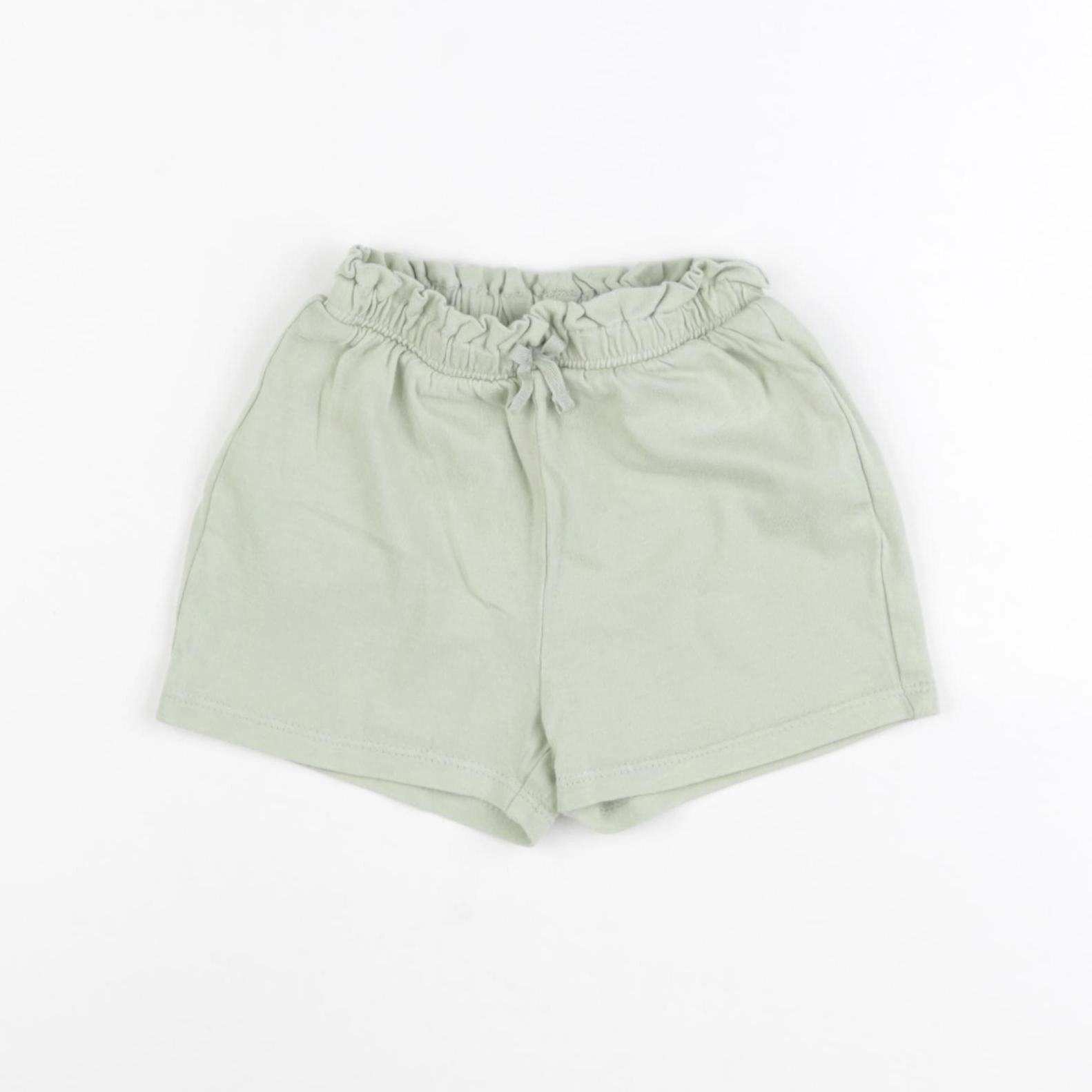 H&M - short vert - 12/18 mois