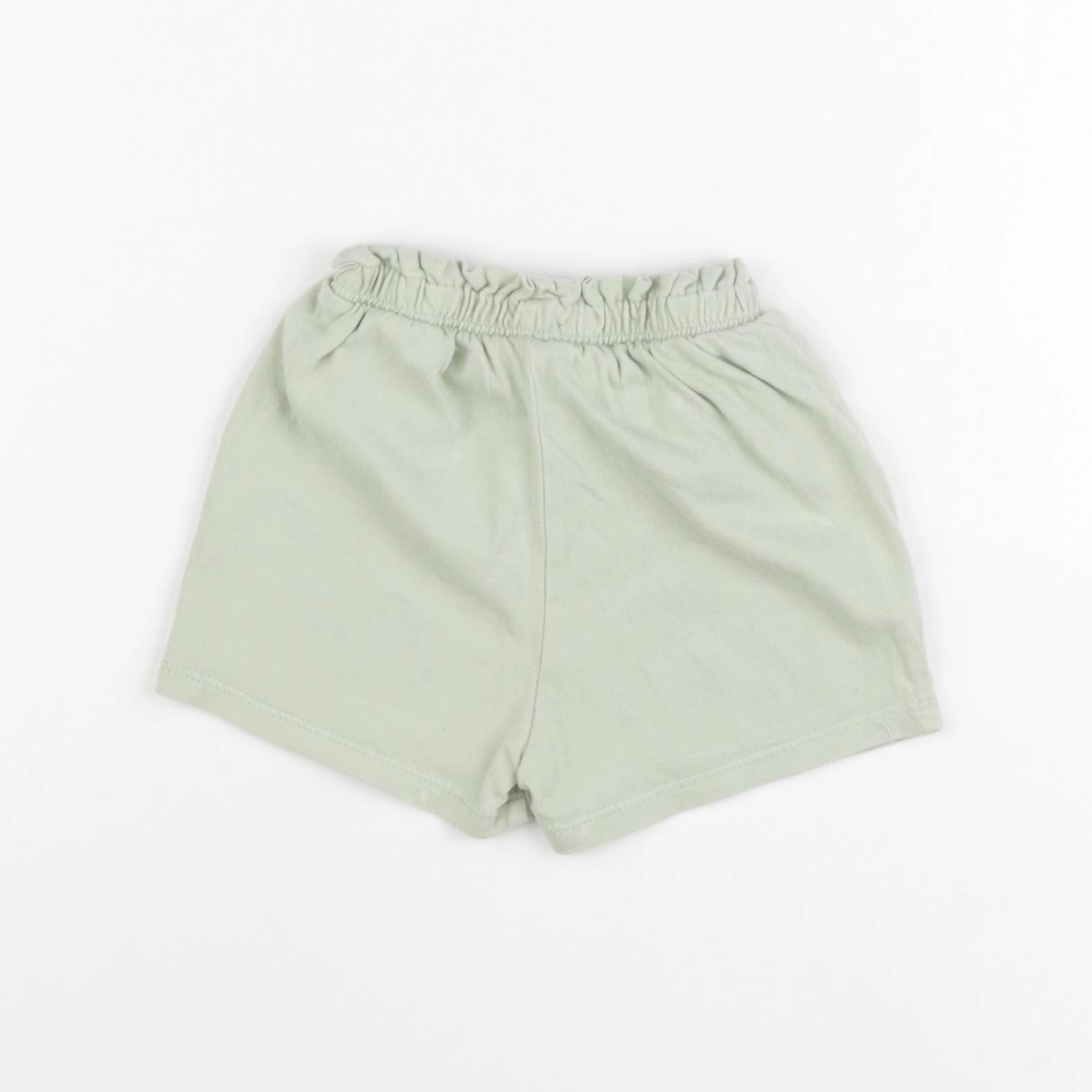 H&M - short vert - 12/18 mois