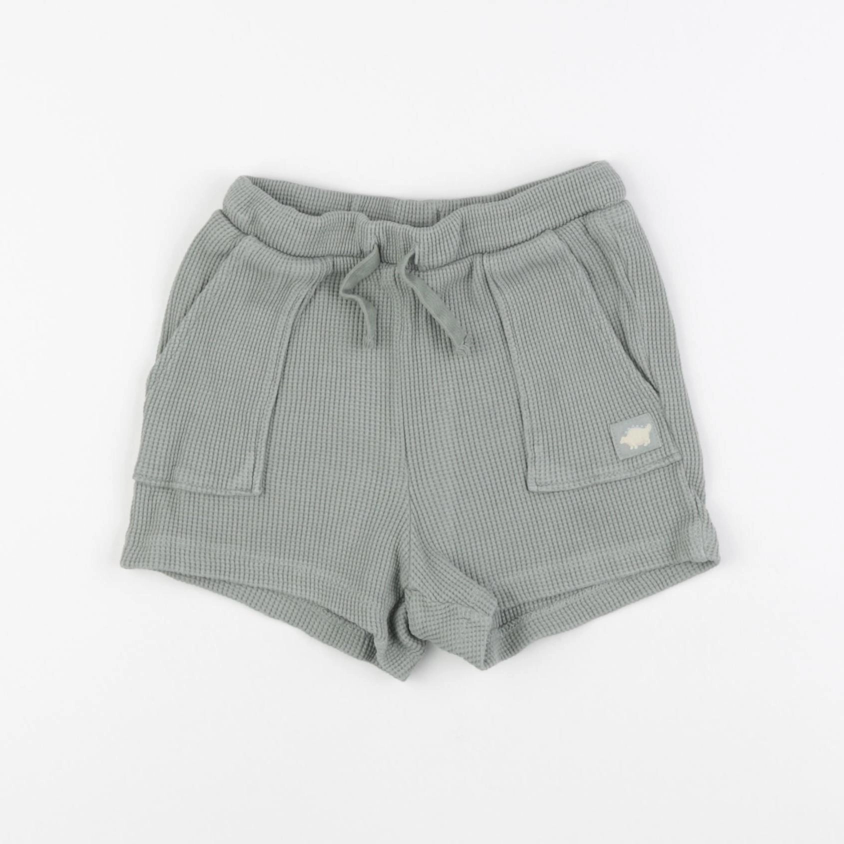 H&M - short vert - 18/24 mois