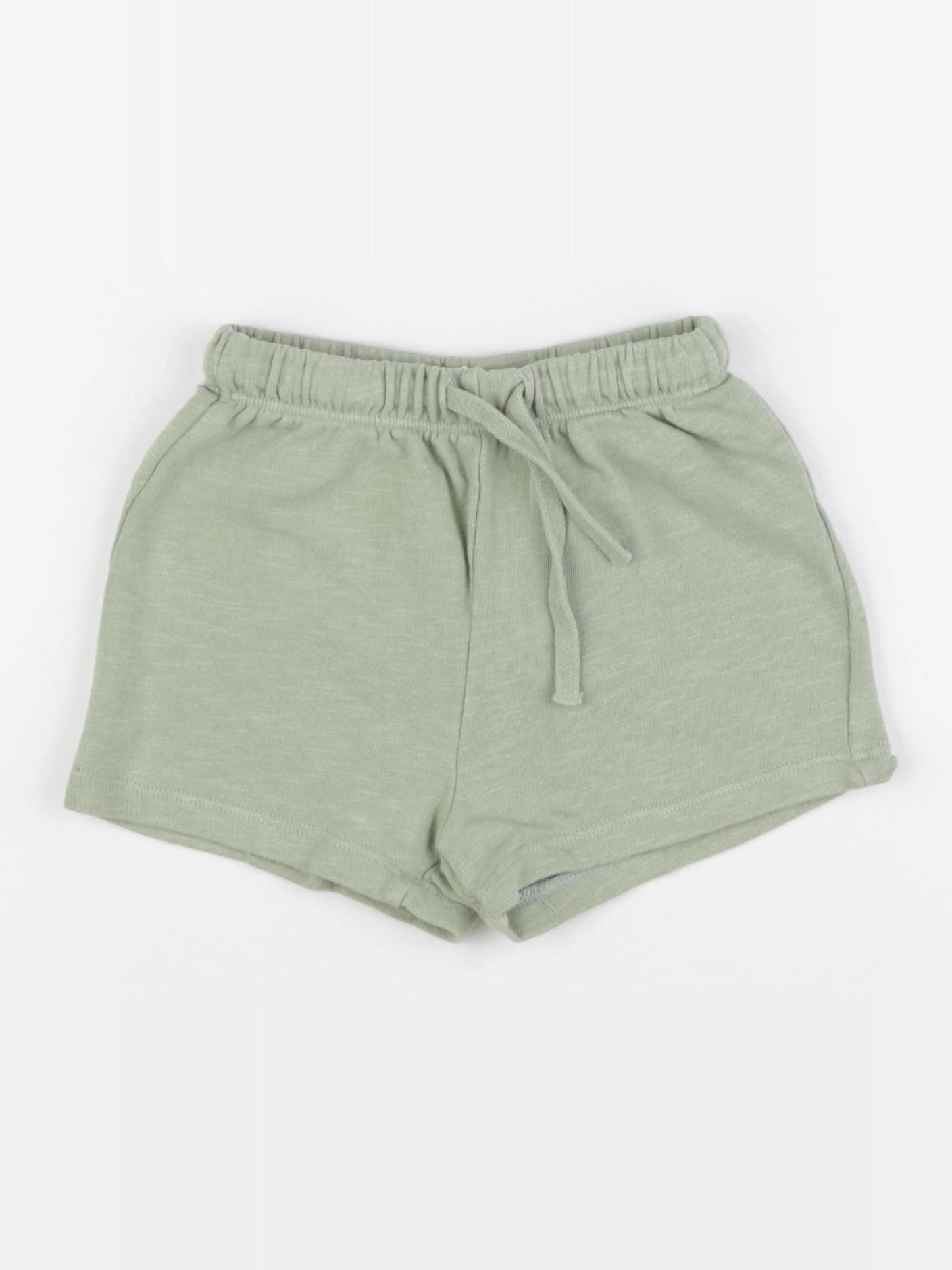 H&M - short vert - 12/18 mois