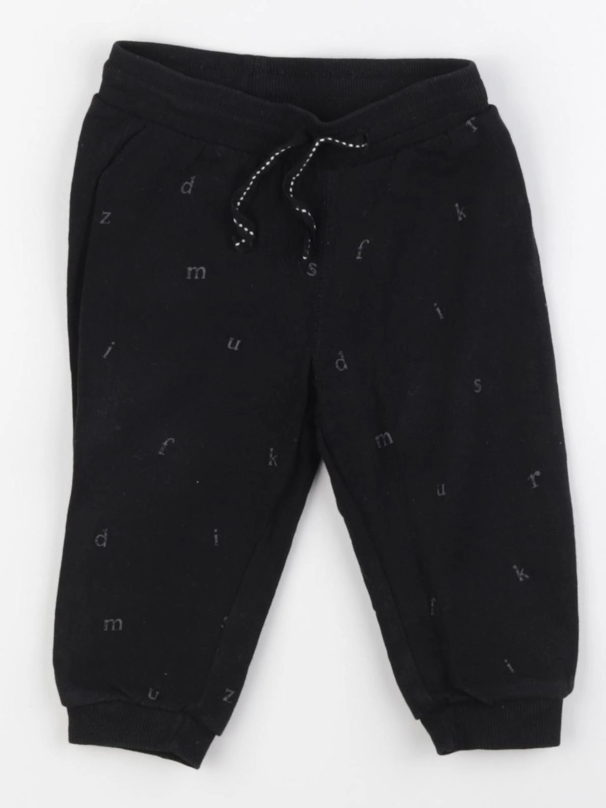 H&M - jogging noir - 6/9 mois