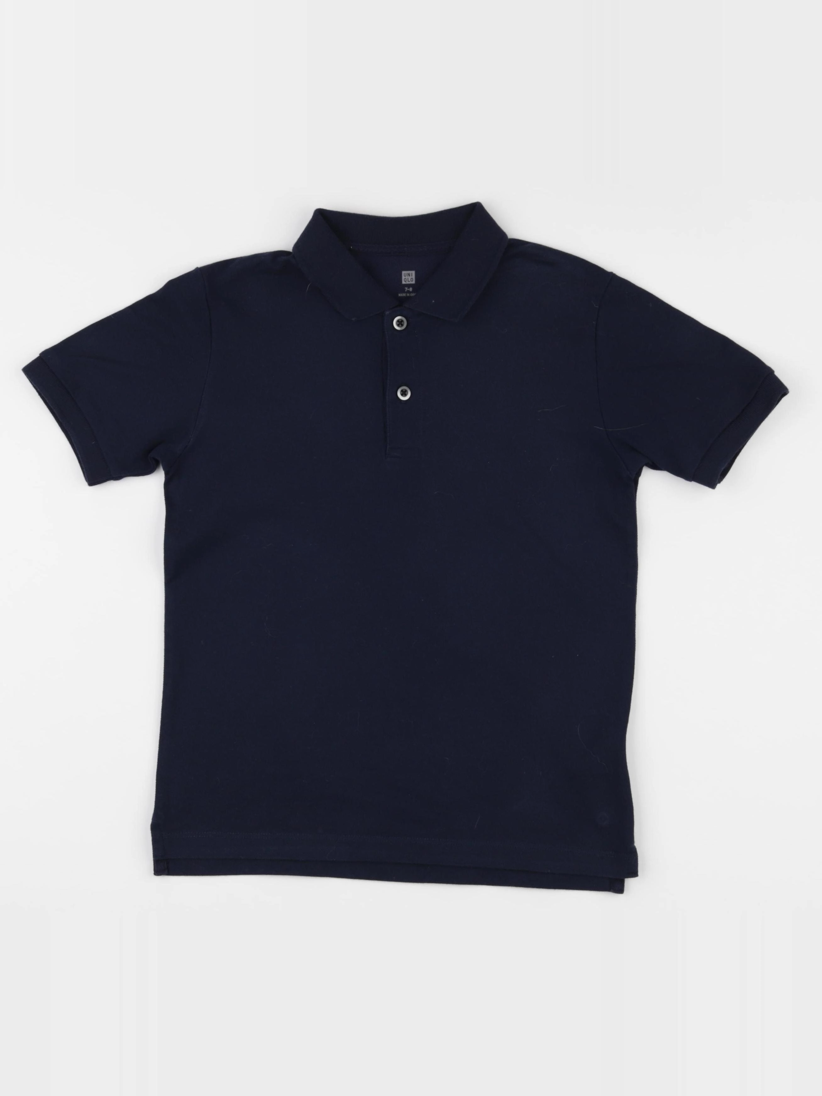 Uniqlo - polo bleu - 7 ans
