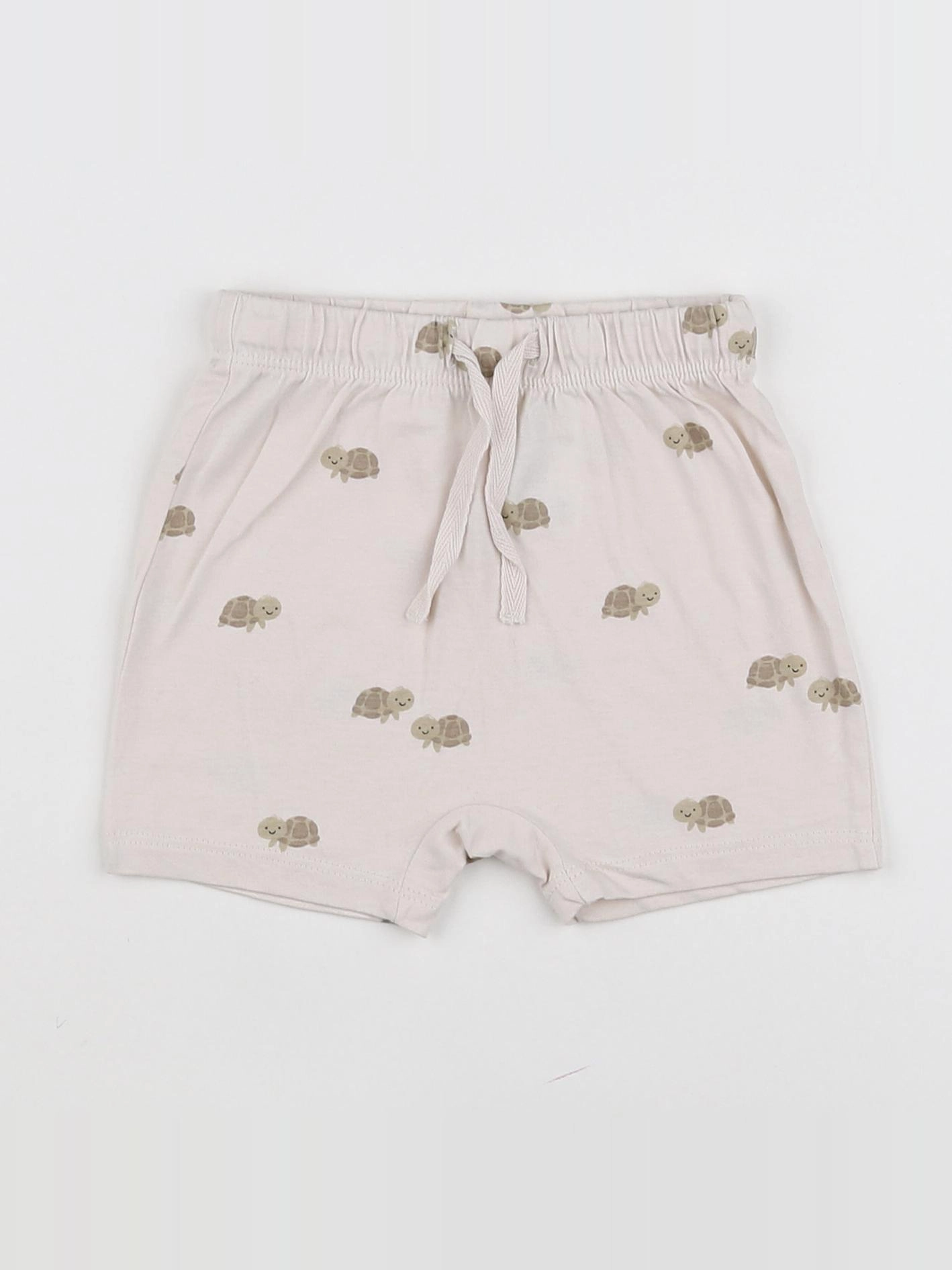 H&M - short beige - 9 mois