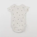 H&M - body beige - 3 mois