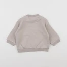 H&M - sweat beige - 3/6 mois