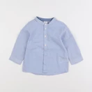 H&M - chemise bleu - 6/9 mois
