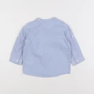 H&M - chemise bleu - 6/9 mois