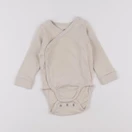 H&M - body beige - 3/6 mois