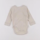 H&M - body beige - 3/6 mois