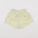 H&M - short jaune - 6/9 mois
