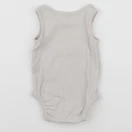 H&M - body beige - 3 mois