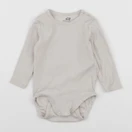 H&M - body beige - 6 mois