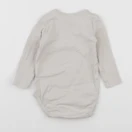 H&M - body beige - 6 mois