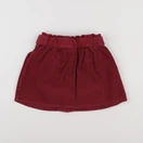 Vertbaudet - jupe rouge - 7 ans