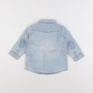 H&M - chemise bleu - 6/9 mois