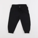 H&M - jogging noir - 12 mois