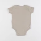 Converse - body beige - 6 mois