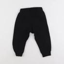 H&M - jogging noir - 18 mois
