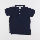 H&M - polo bleu - 12/18 mois