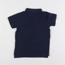H&M - polo bleu - 12/18 mois