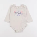 Nike - body beige - 9 mois