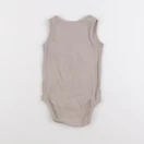 H&M - body beige - 12/18 mois