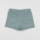 Vertbaudet - short vert - 7 ans
