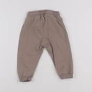H&M - jogging beige - 9/12 mois