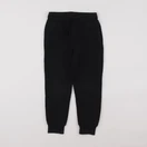 H&M - jogging noir - 5/6 ans