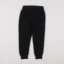 H&M - jogging noir - 5/6 ans
