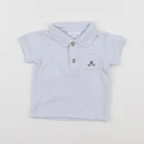 Jacadi - polo bleu - 6 mois