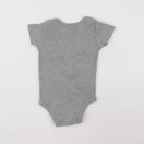 Nike - body gris - 0/6 mois