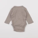 H&M - body beige - 1 mois