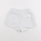 H&M - short blanc - 9/10 ans