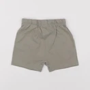 H&M - short vert - 18/24 mois