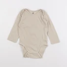 H&M - body beige - 9/12 mois
