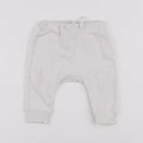 H&M - sarouel beige - 3/6 mois