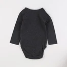 H&M - body noir - 6/9 mois