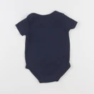 Levi's - body bleu - 0/6 mois