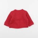 Boutchou - gilet rouge - 6 mois