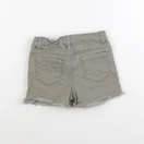 Tape à l'oeil - short vert - 4 ans