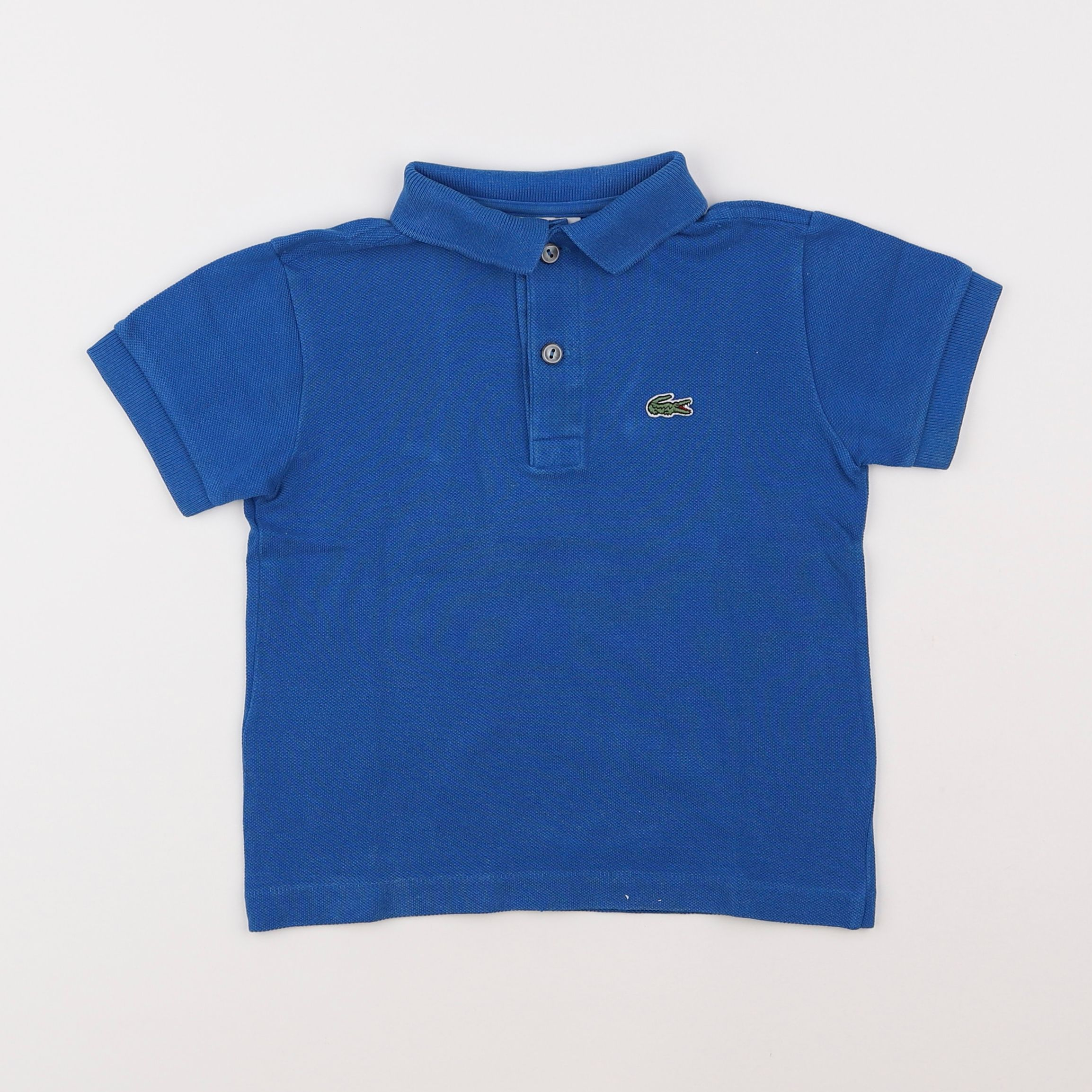 Lacoste - polo bleu - 4 ans